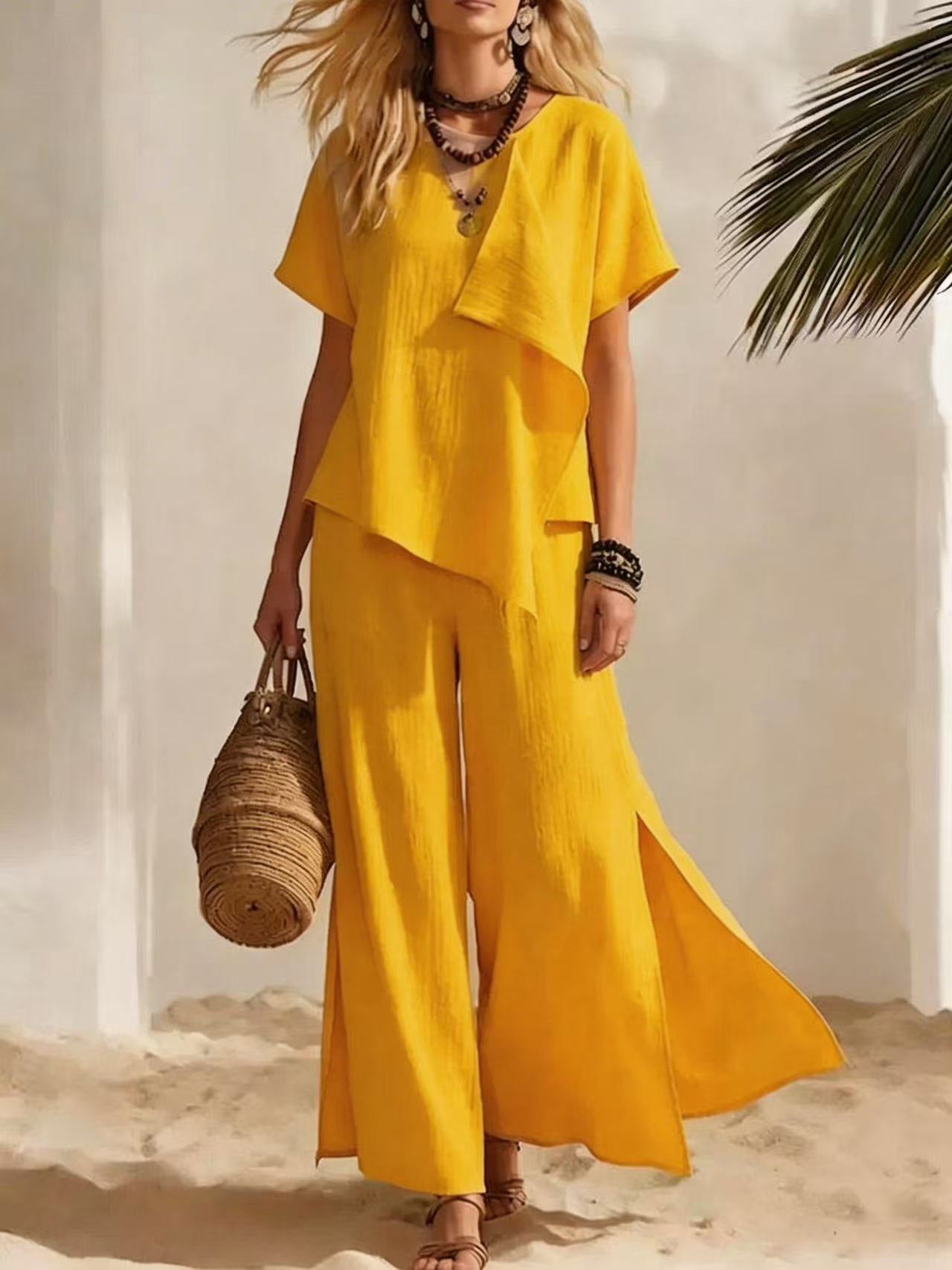 Lässiges asymmetrisches kurzärmliges Oberteil und Hose mit weitem Bein und Schlitz im Set