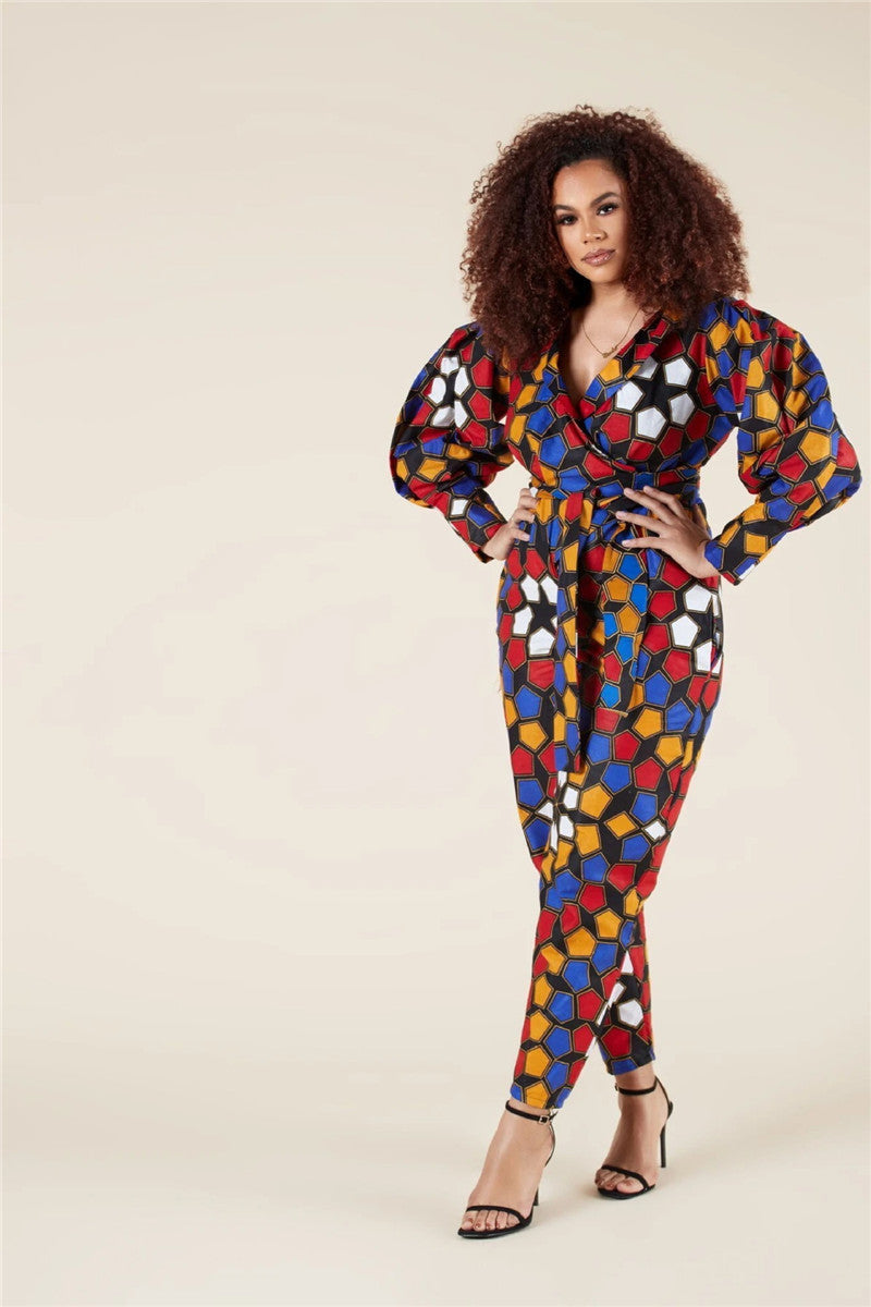 Damen Jumpsuit mit V-Ausschnitt, langen Ärmeln, afrikanischem Muster und verkürzter Hose