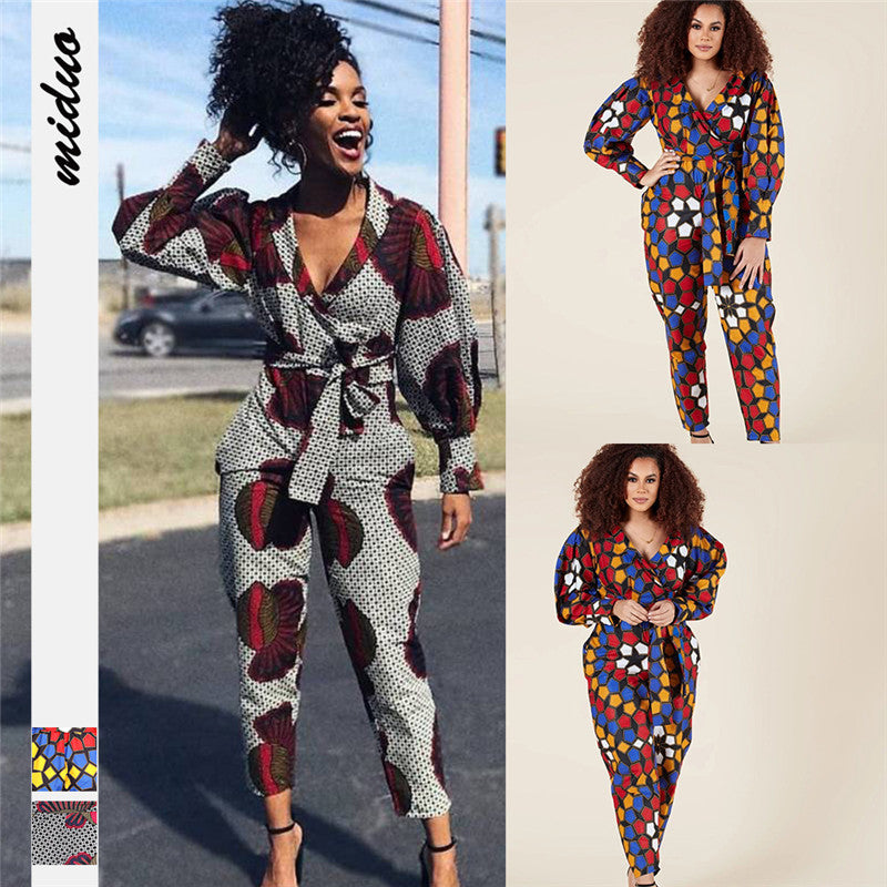 Damen Jumpsuit mit V-Ausschnitt, langen Ärmeln, afrikanischem Muster und verkürzter Hose