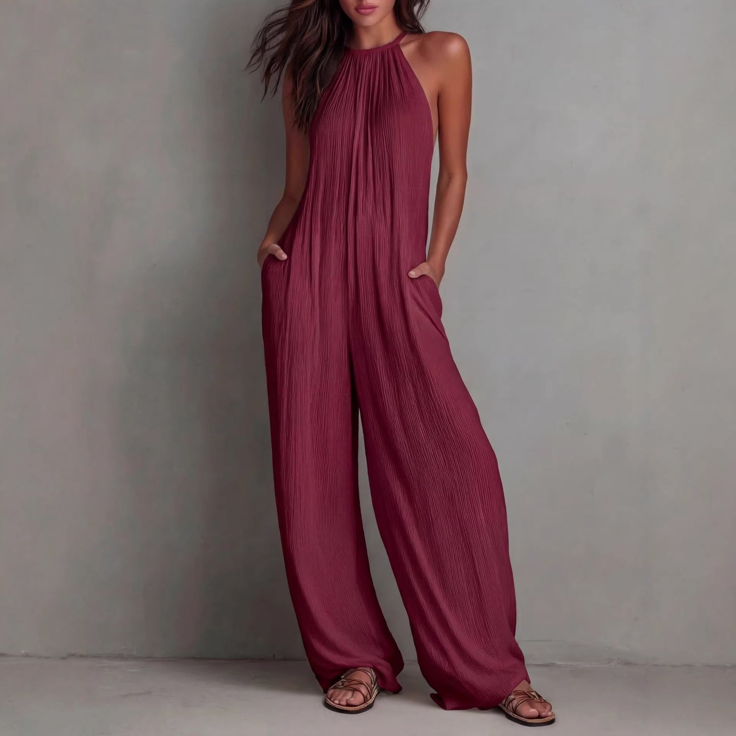 Weißer, plissierter Jumpsuit im Resort-Stil mit offener Rückenpartie und weitem Bein